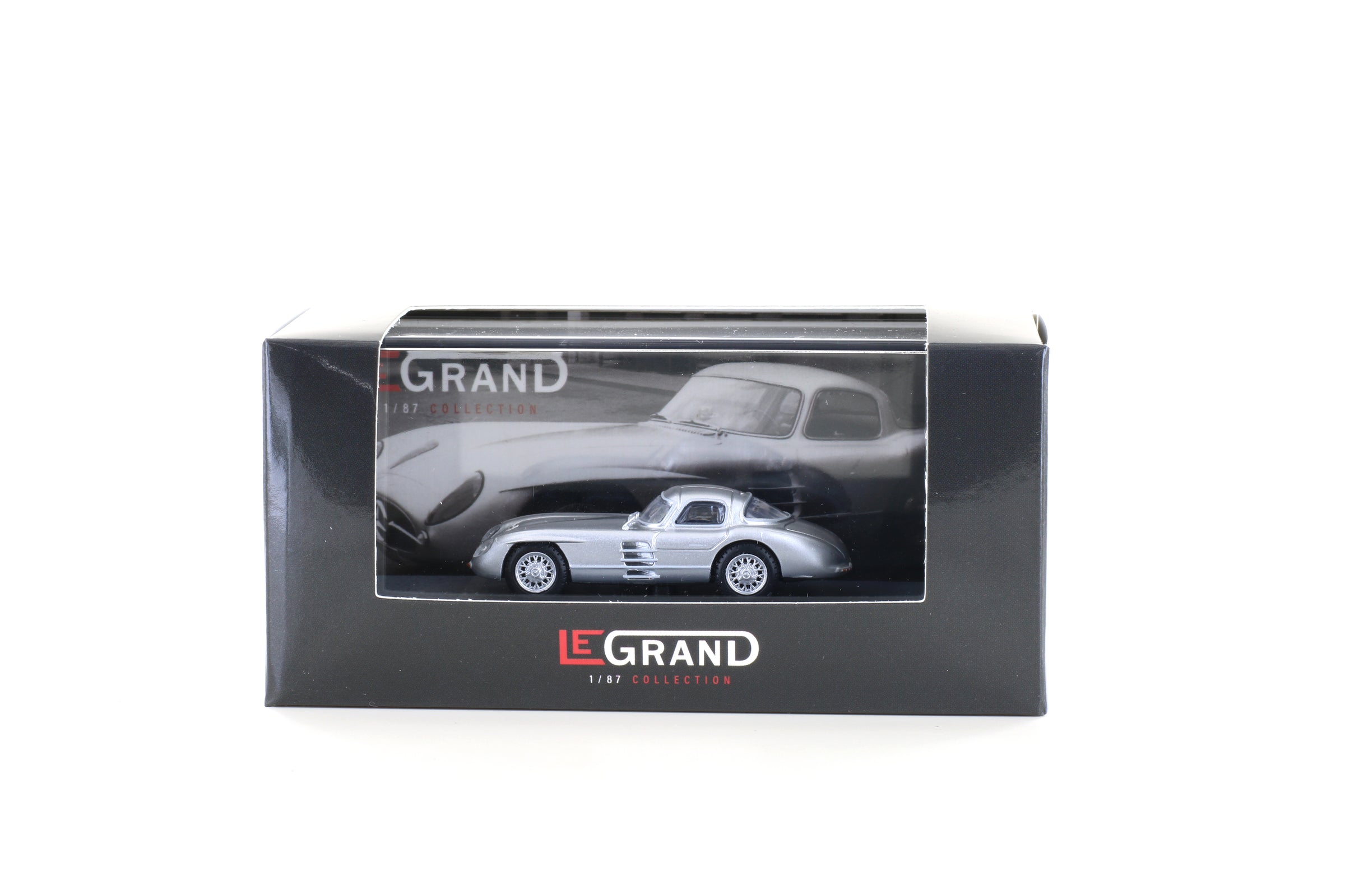 Mercedes Benz 300 SLR Uhlenhaut Mercedes-Benz 300 SLR Uhlenhaut Coupé, argent, bleu - 1/87Coupé, argent, intérieur rouge, échelle 1/87